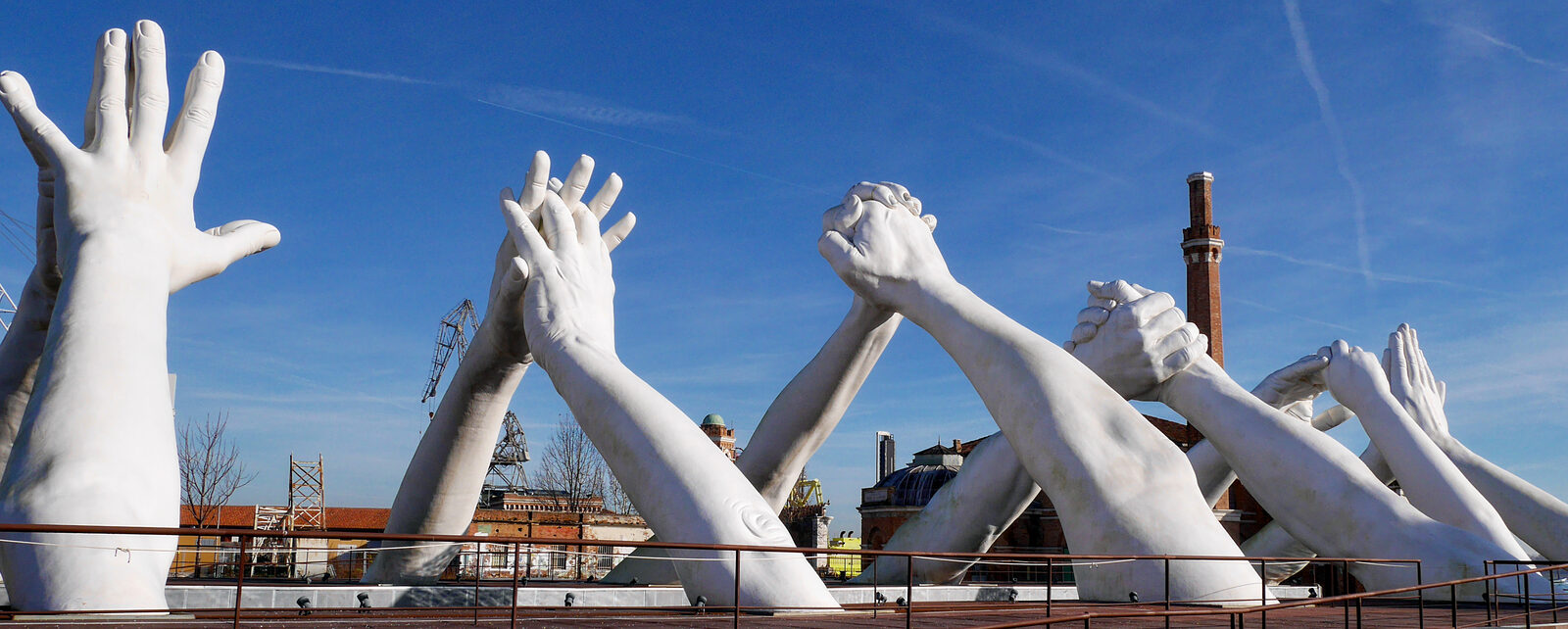 Arsenale : The 6 pairs of monumental hands comprising the Building Bridges art display