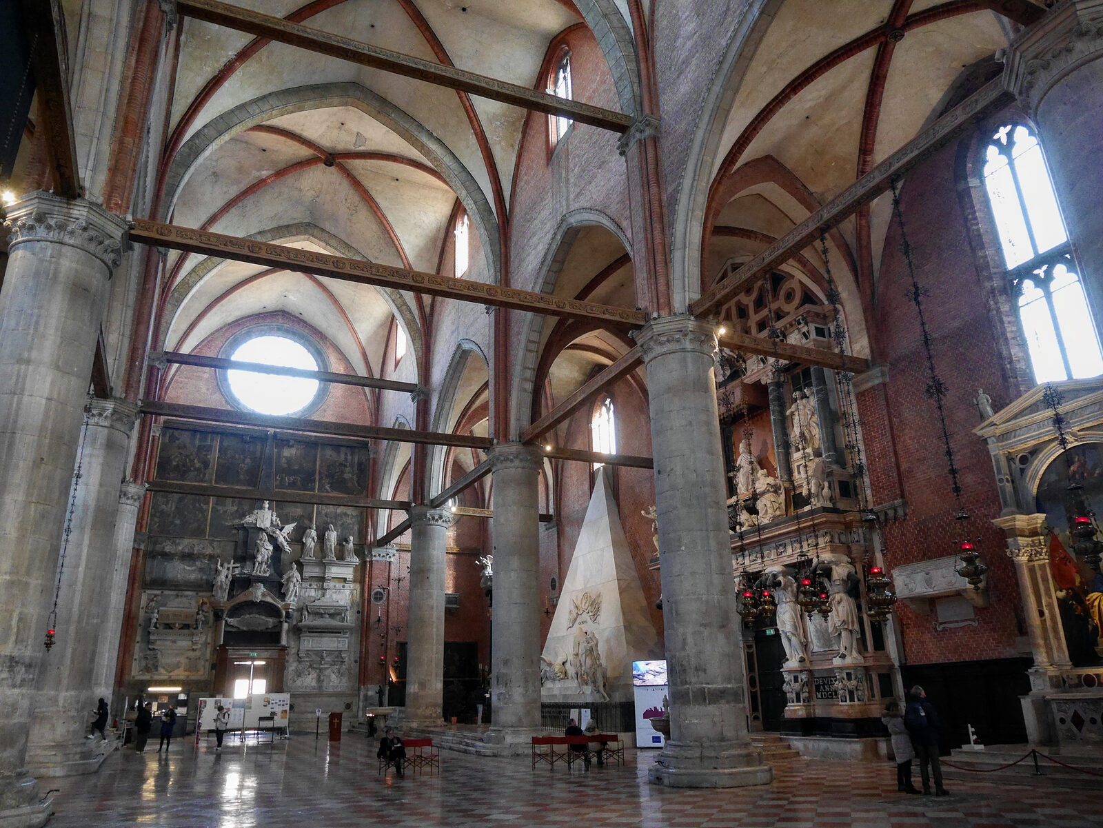 Basilica dei Frari : Gazing at the counter facade with Canova's mausoleum to the right provides a perspective on the grandeur of the basilica