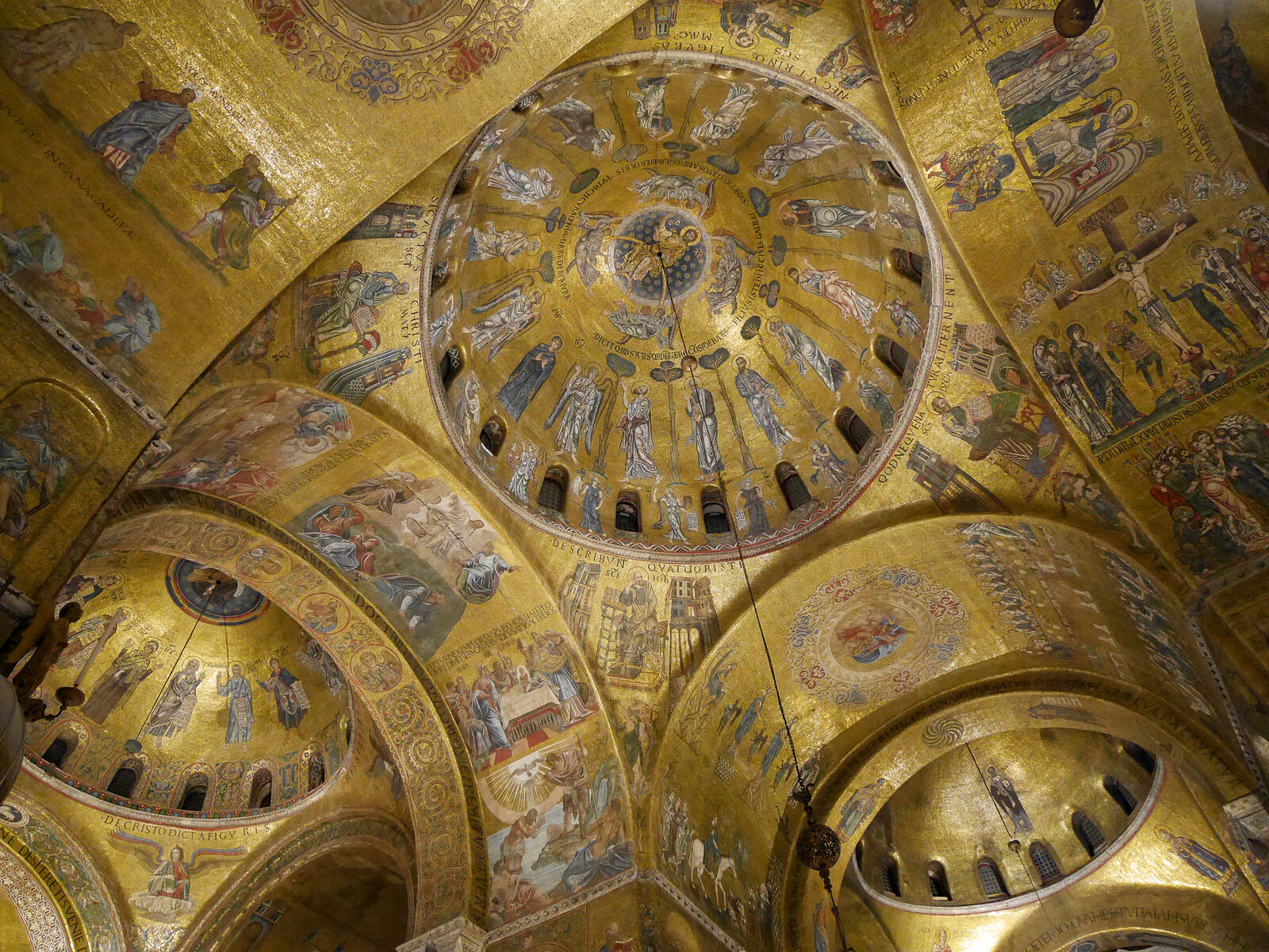 Basilica di San Marco : Lose yourself in the endless biblical tales shimmering across the gilded mosaics of the celestial upper part