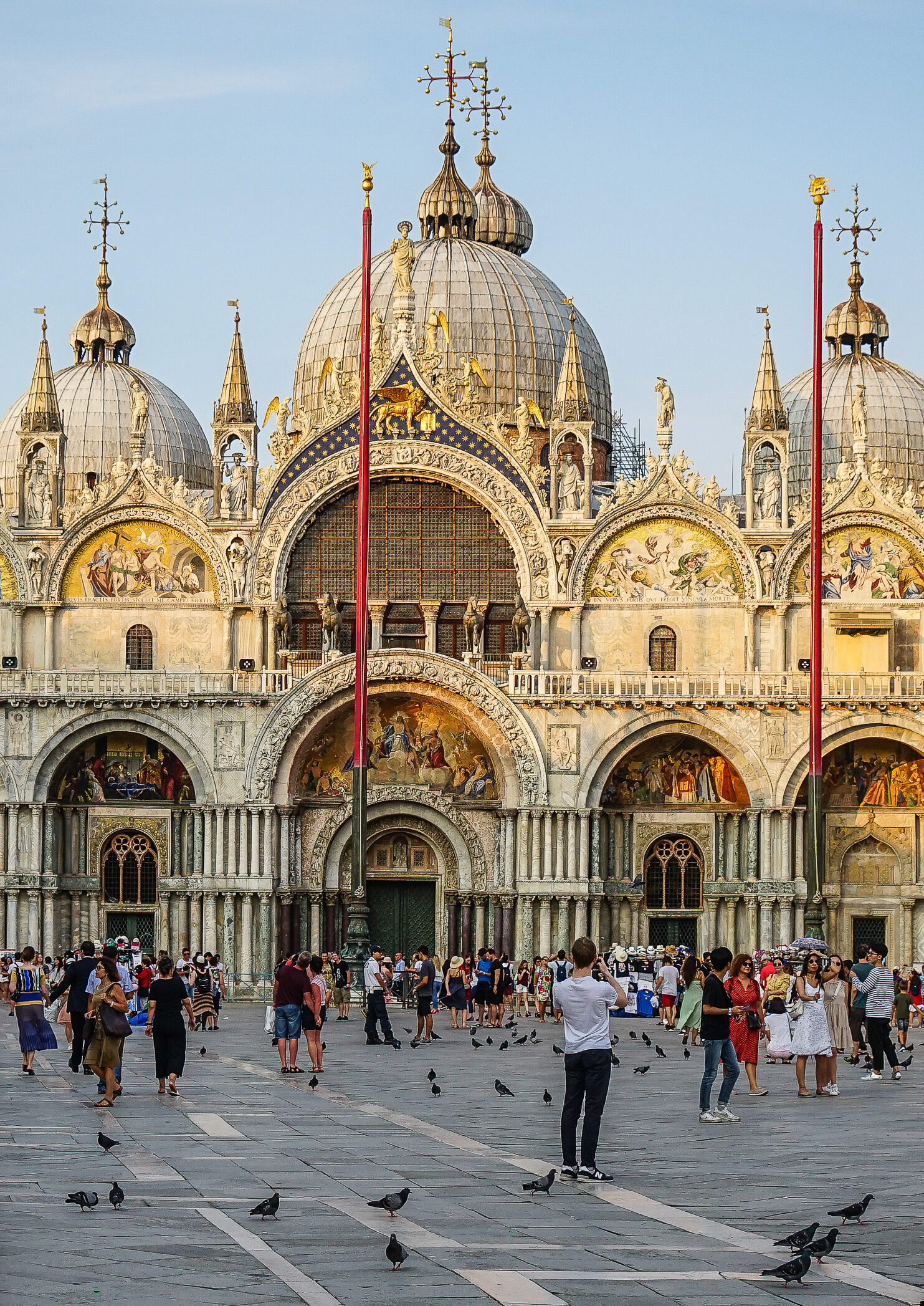Basilica di San Marco : The western facade as seen from ground level in Piazza San Marco, close to sunset