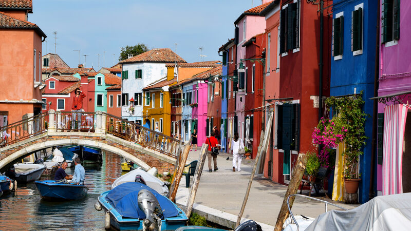 Burano : The iconic pastel-colored houses are unique within the Venetian lagoon