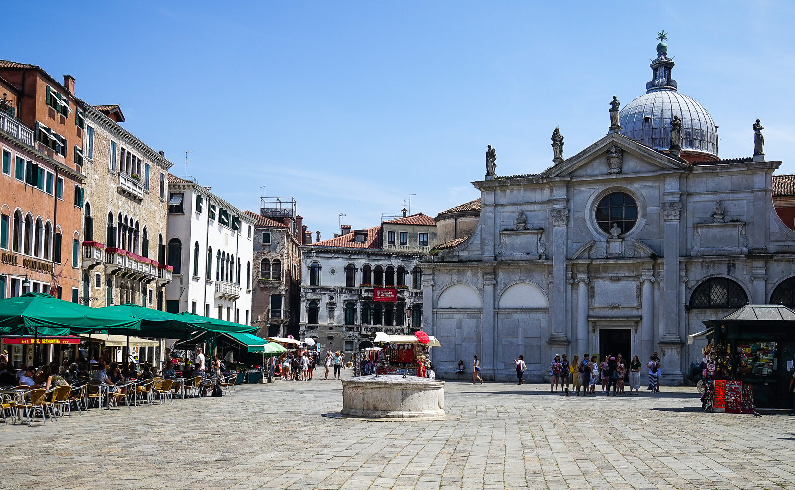 Campo Santa Maria Formosa : Southward view of the campo, framed by inviting cafés and the Baroque facade of Santa Maria Formosa