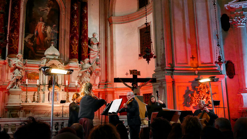 Chiesa della Pieta (Vivaldi Church) : A vibrant red mirrors the intense heat and passion of summer