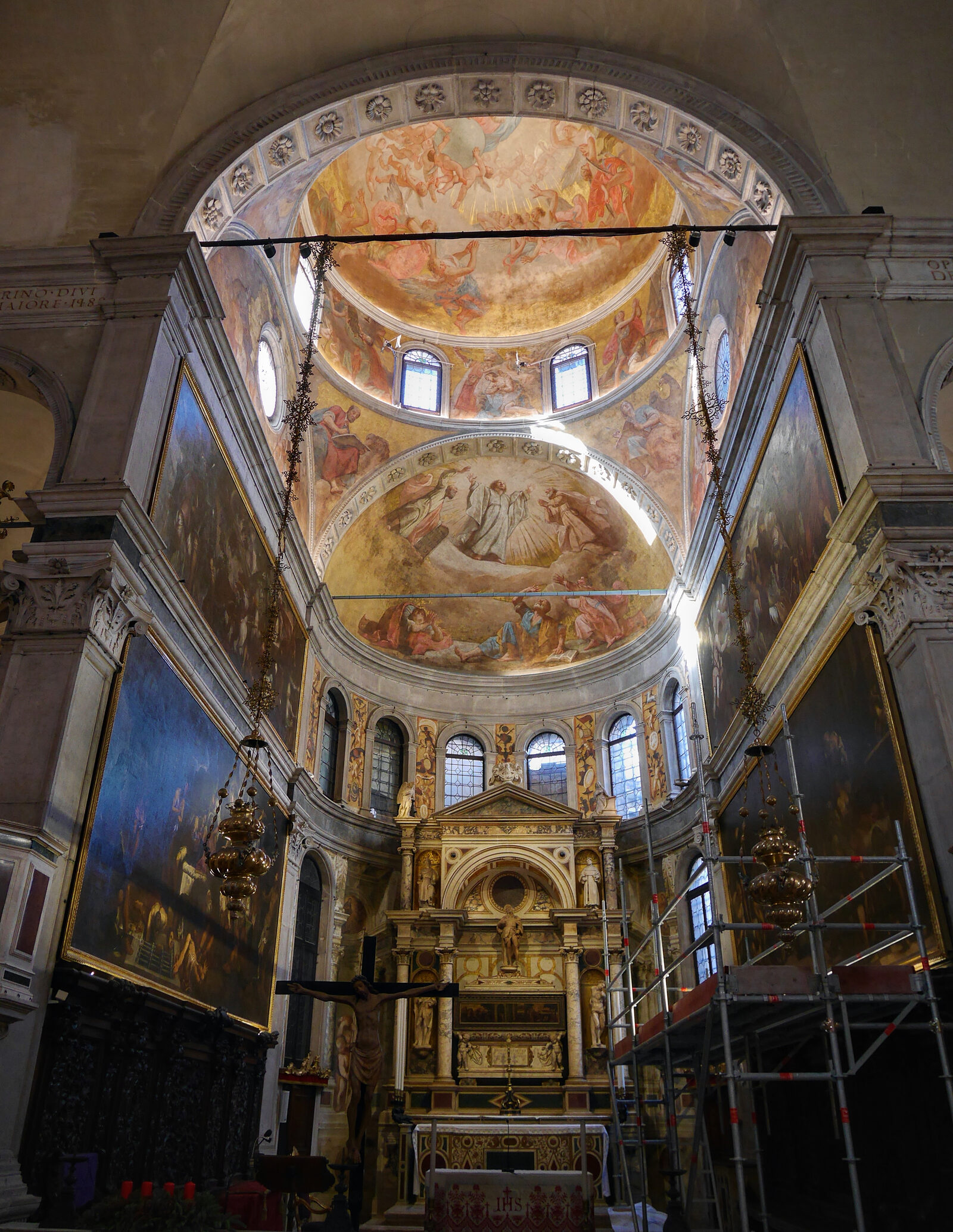 Chiesa di San Rocco : The high altar is surrounded with works by Tintoretto depicting the life of Saint Roch, whose casket and statue are above the altar