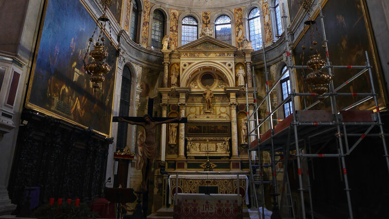 Chiesa di San Rocco : The high altar is surrounded with works by Tintoretto depicting the life of Saint Roch, whose casket and statue are above the altar