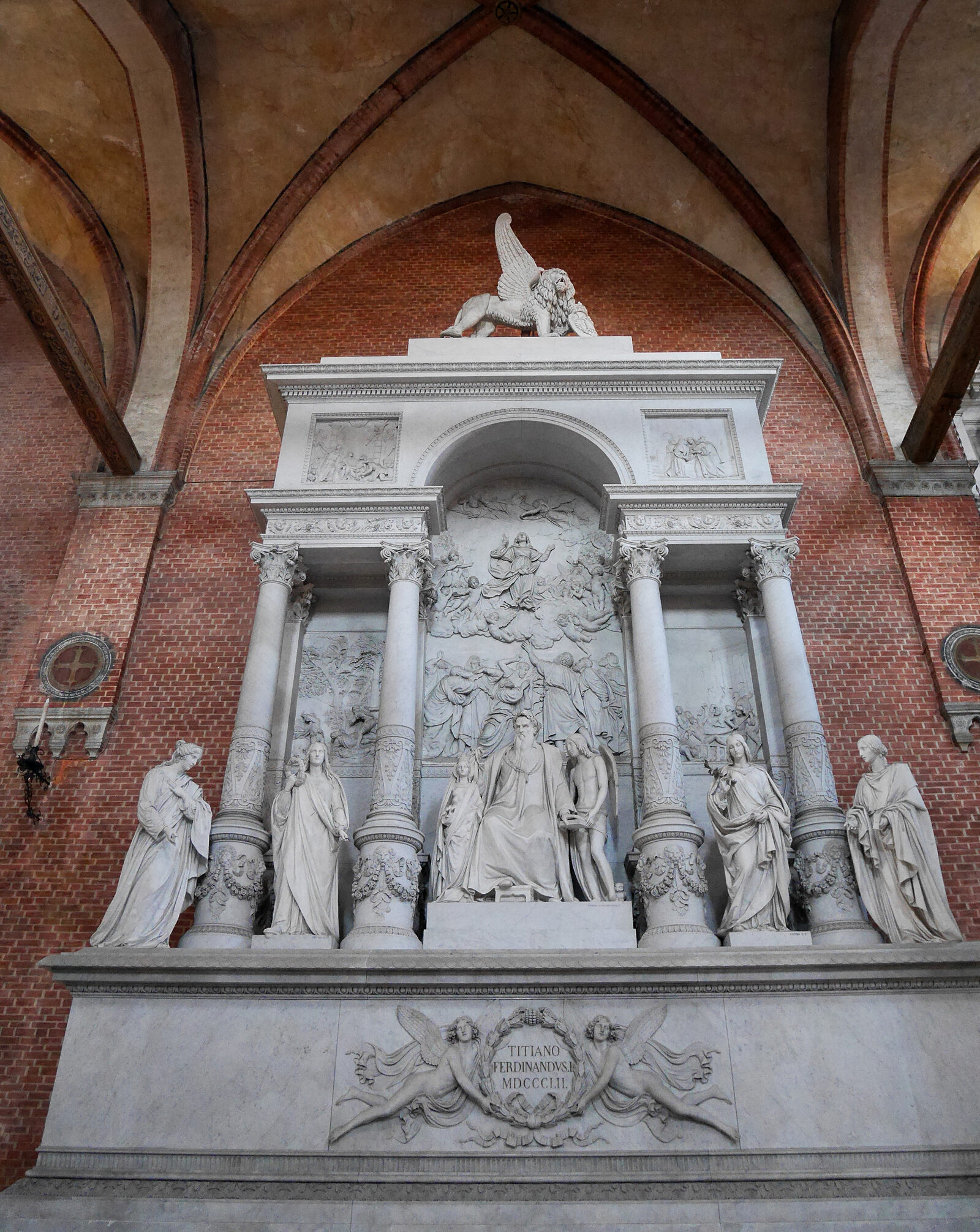 Frari Basilica : However, Titian does have his own mausoleum. He was buried in the church after succumbing to the plague in 1576.