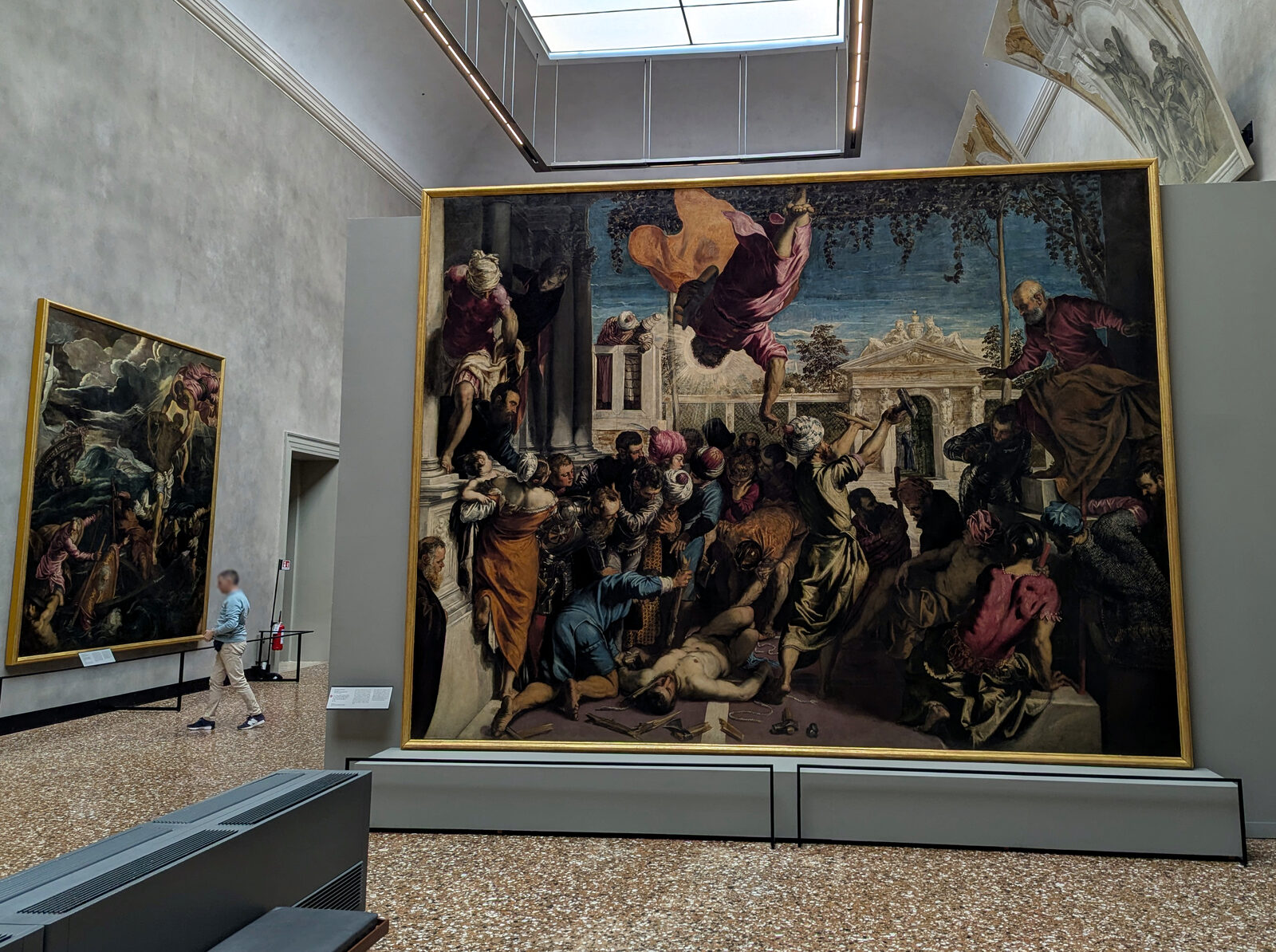 Gallerie dell'Accademia : Tintoretto's Saint Mark Rescuing the Slave (1548), originally painted for Scuola di San Marco, depicts the evangelist swooping into the scene mid-flight and shattering the instruments of torture to save a devoted slave from martyrdom