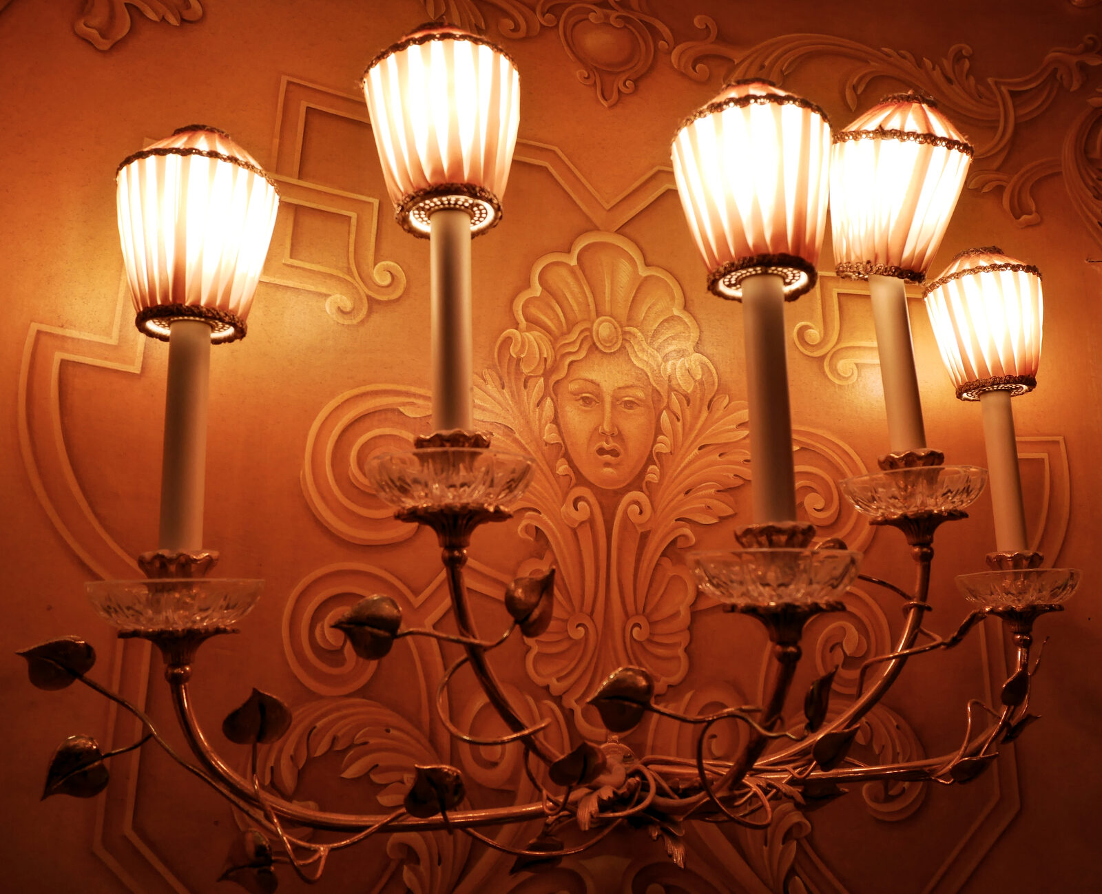 La Fenice : There are plenty of details to notice, even in the spaces between the arms of the wall sconces