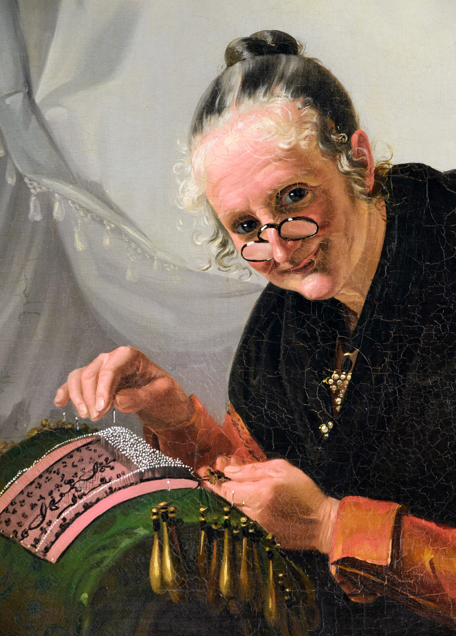 Lace Museum : And this painting shows an elderly lacemaking woman at work