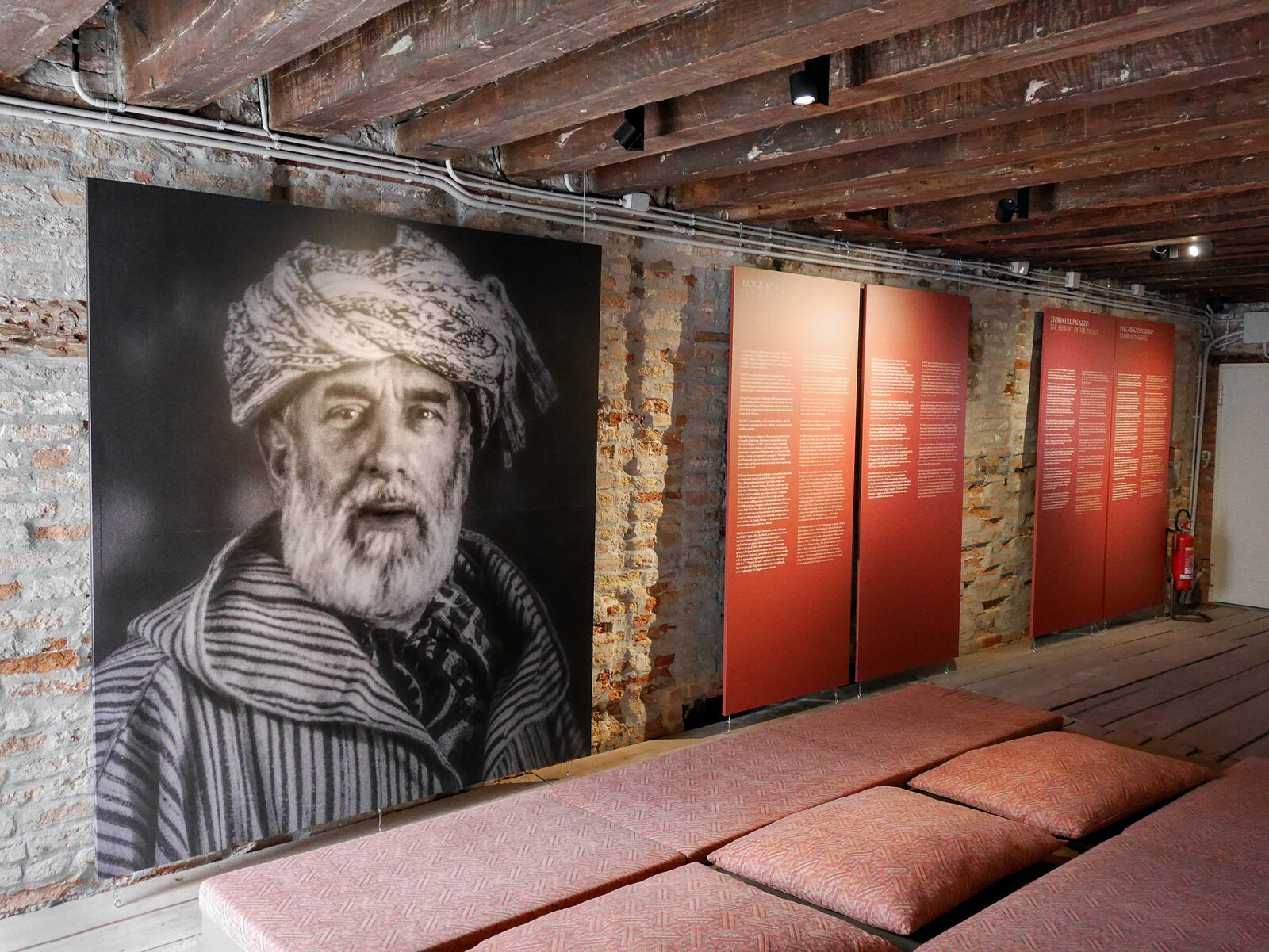 Palazzo Fortuny : Upon entering the museum, you are greeted by a photograph of Mariano Fortuny  alongside biographical panels