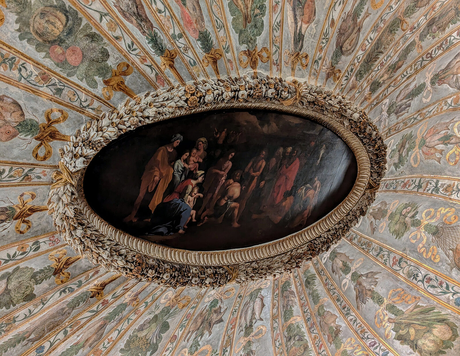 Palazzo Grimani : The Dining Room's ceiling: festoons of fowl, vegetables, and fish, intertwined with floral bands with 'Saint John baptizing the crowd' at its center