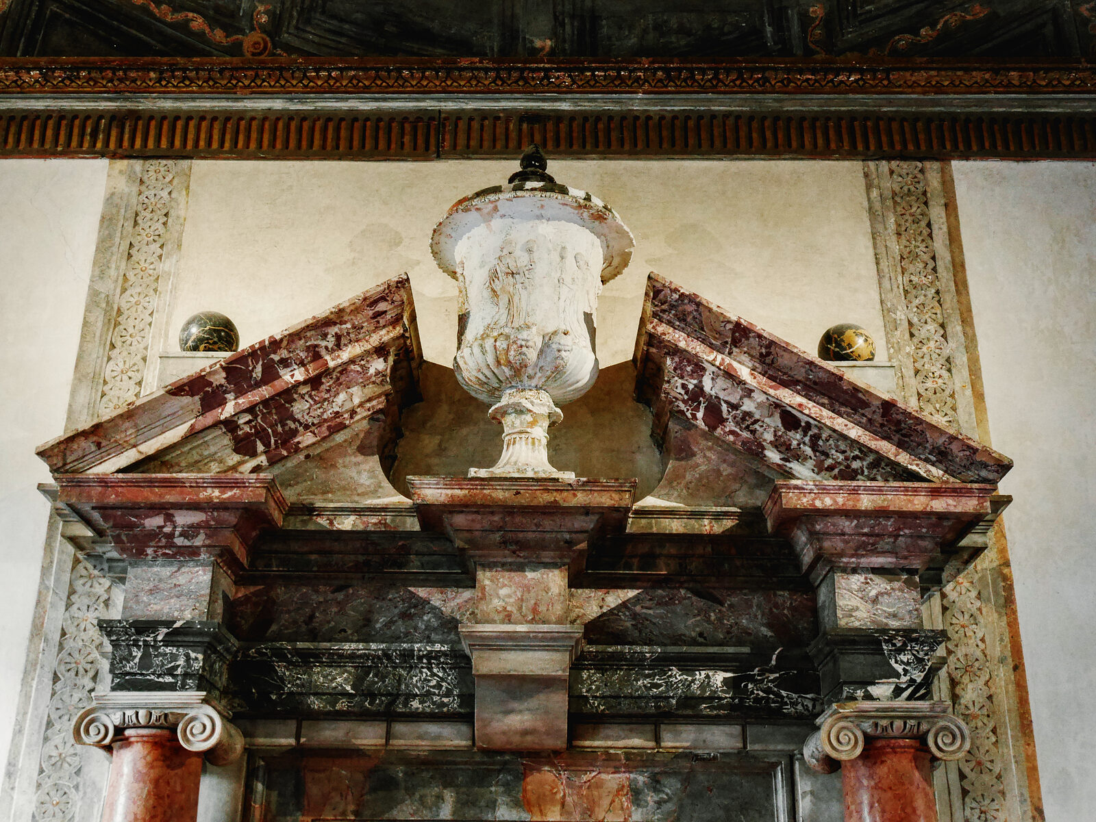 Palazzo Grimani : The magnificent fireplace crowned by vibrant colored marble is the focal point of the Fireplace Room