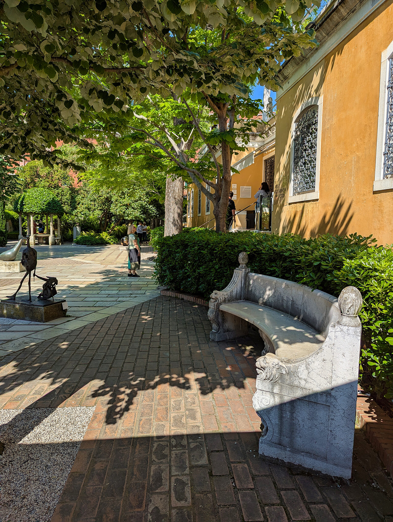 Peggy Guggenheim Collection : Once outside in the garden, artsy stone benches tucked in the shade invite you to linger