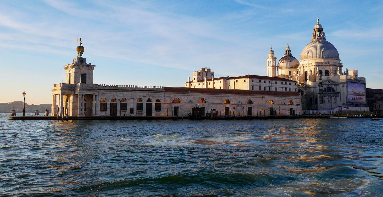 Punta della Dogana : The former customs house sits at the entrance of Canal Grande, next to Santa Maria della Salute (visible on the right side of the photo).