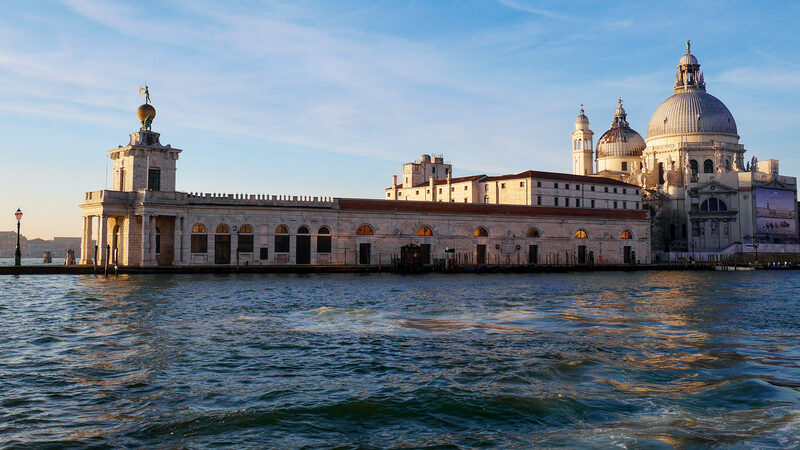 Punta della Dogana : The former customs house sits at the entrance of Canal Grande, next to Santa Maria della Salute (visible on the right side of the photo).