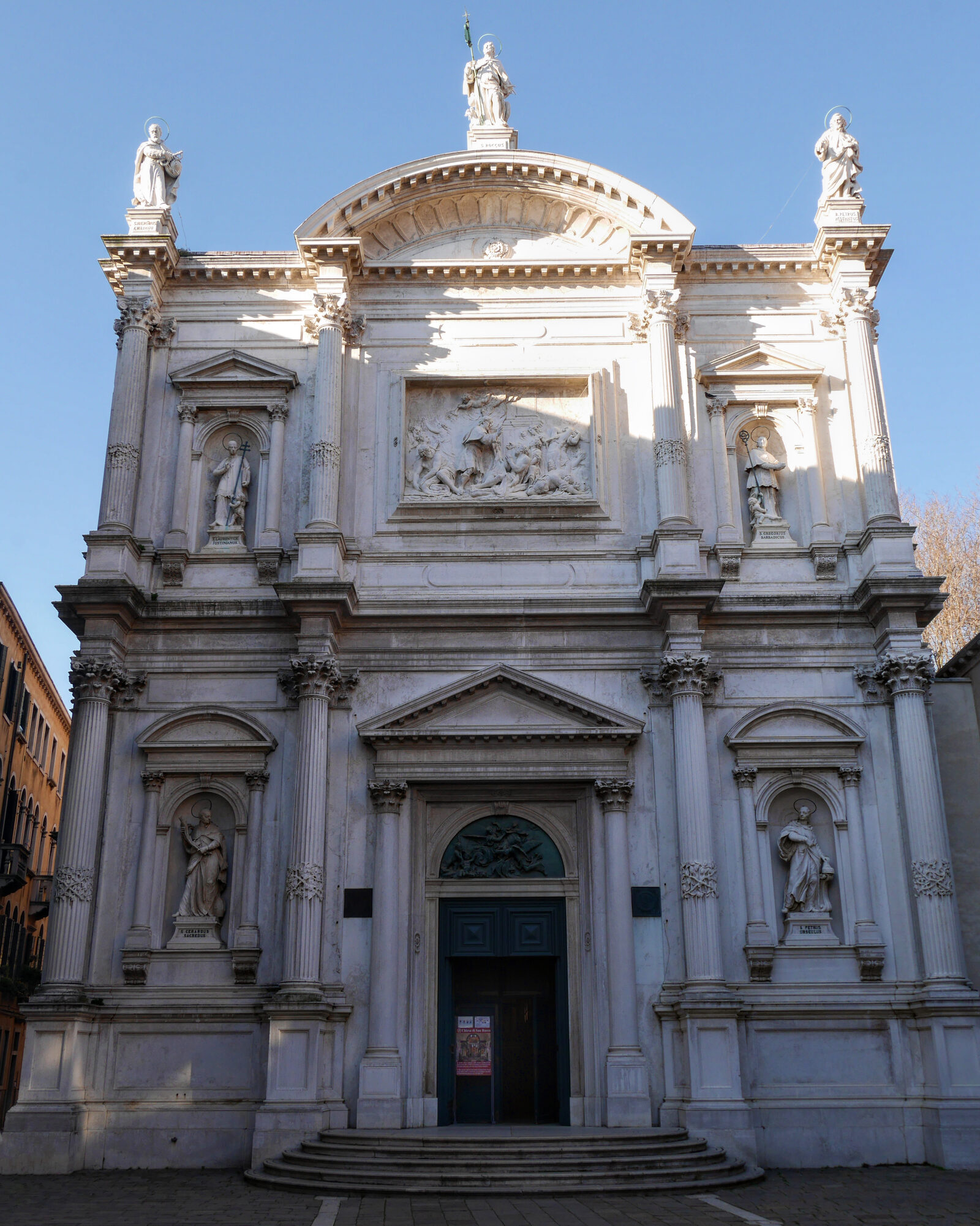 San Rocco : The facade is embellished with statues, with a central relief depicting St. Roch healing the plague-stricken