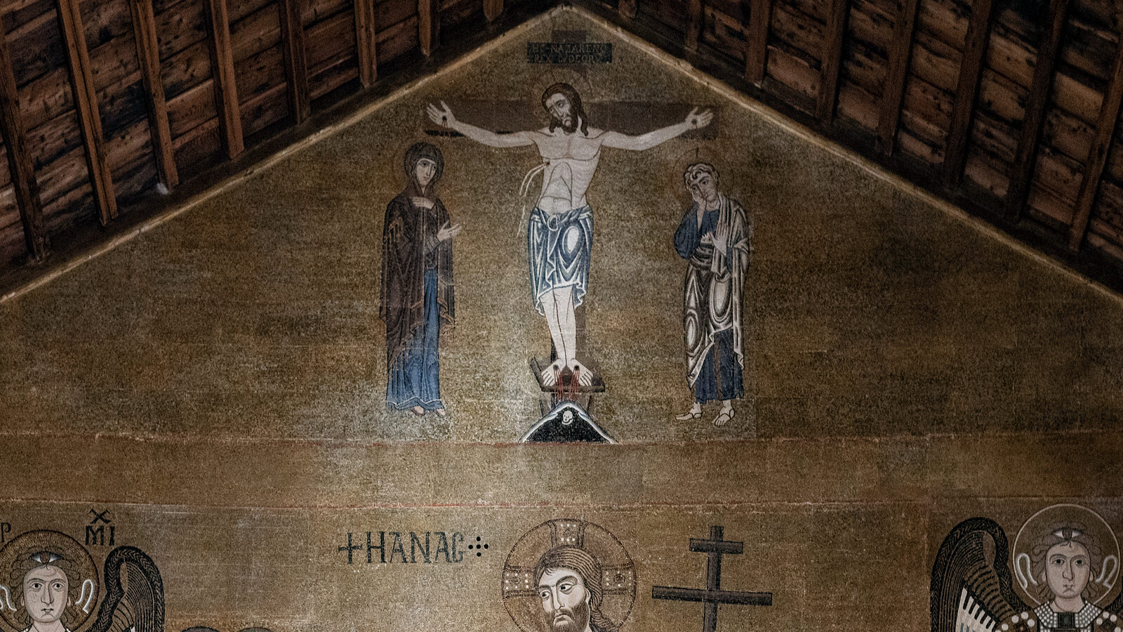 Santa Maria Assunta : The top section is the Crucifixion: Christ is nailed to the cross, flanked by Mary and John the Evangelist