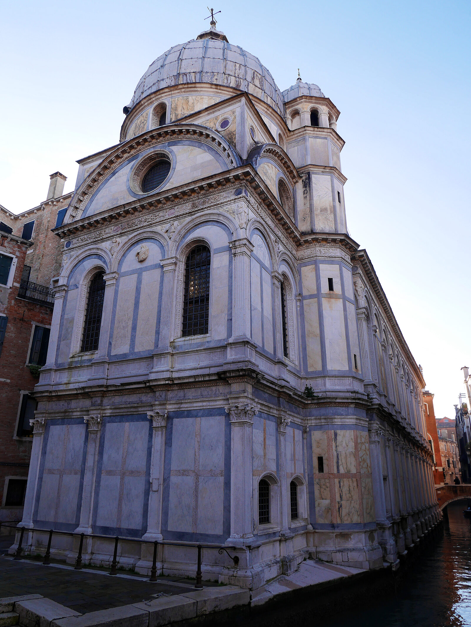 Santa Maria dei Miracoli : The rear facade, with the dome and the gracefully integrated small bell tower that rises 17 meters high