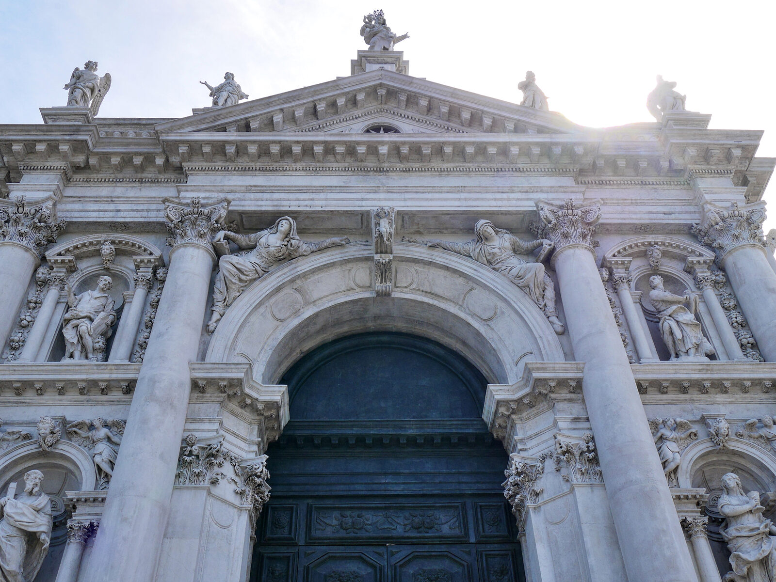 Santa Maria della Salute : Time to head inside — after such an exuberant facade adorned with more than 100 statues, the interior should be equally awe-inspiring