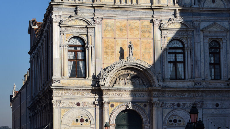 Scuola di San Marco : The facade features many marble statues of angels, warriors, and other fantastical creatures