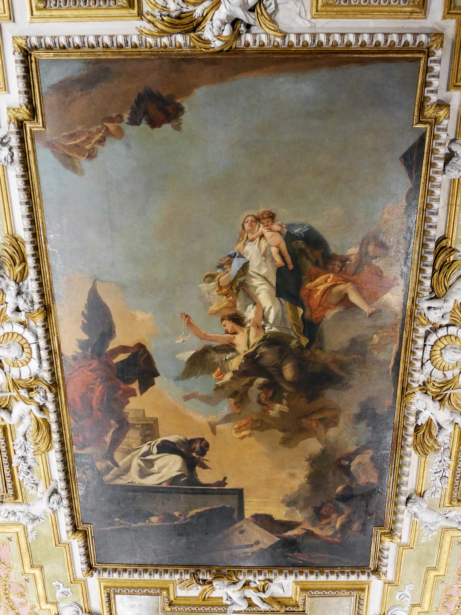 Scuola Grande Carmini : The centerpiece of the hall's ceiling is 'The Virgin handing the Scapular to Saint Simon Stock' by Tiepolo (1749)