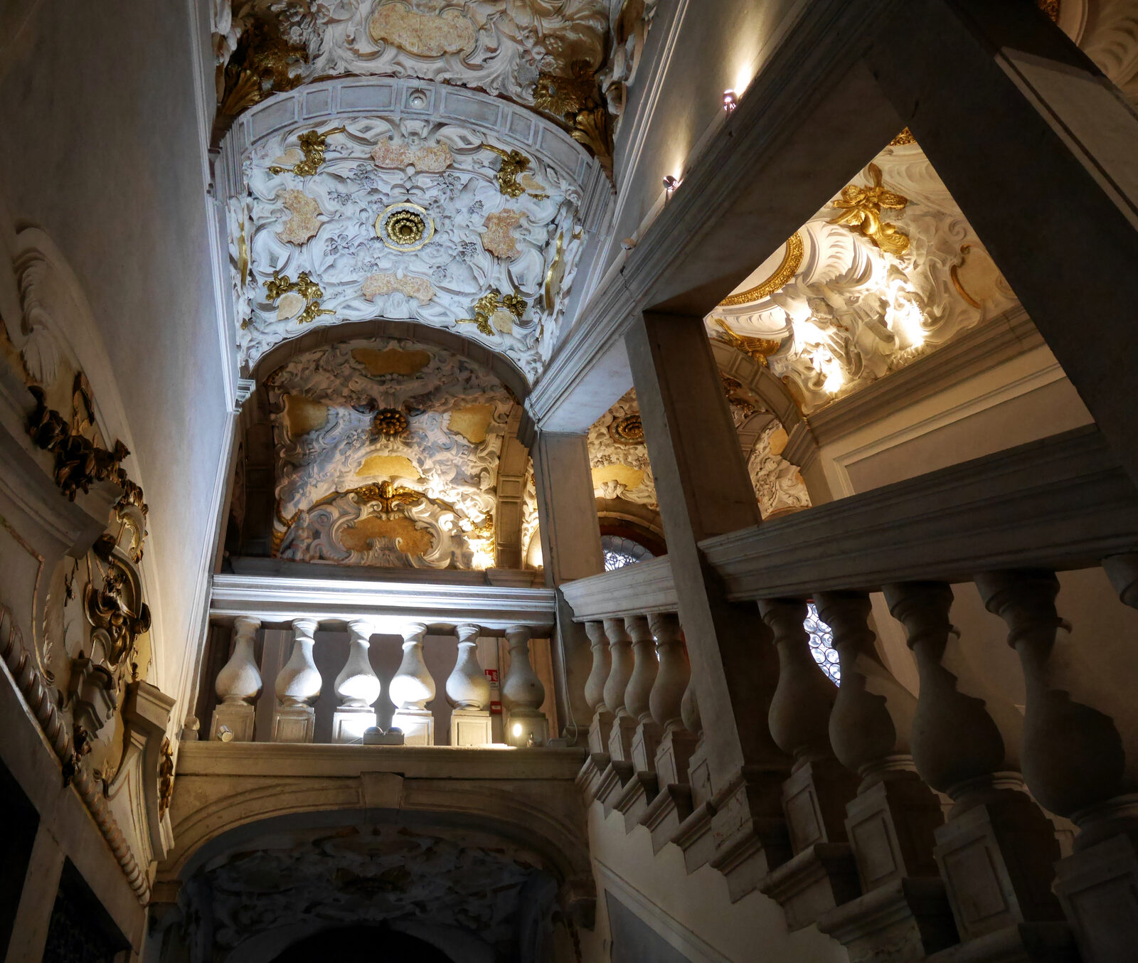 Scuola Grande dei Carmini : The grand staircase boasts elaborate gold-leafed plasterwork on the ceiling
