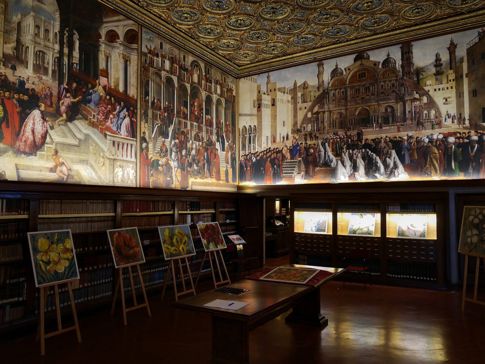 Scuola Grande San Marco : The smaller Sala dell'Albergo (hostel room) displays digital reproductions of the paintings originally housed within, depicting episodes from the life of Saint Mark