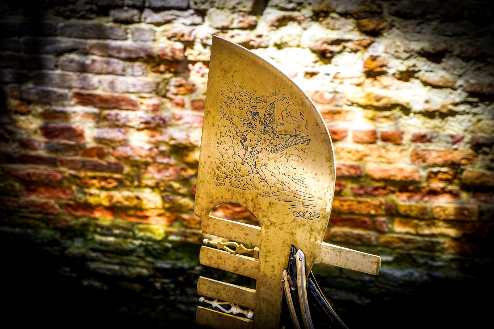 Squero di San Trovaso : The ornament on the front of the boat ('ferro' - Italian for iron) serves also a practical purpose: offsetting the gondolier's weight