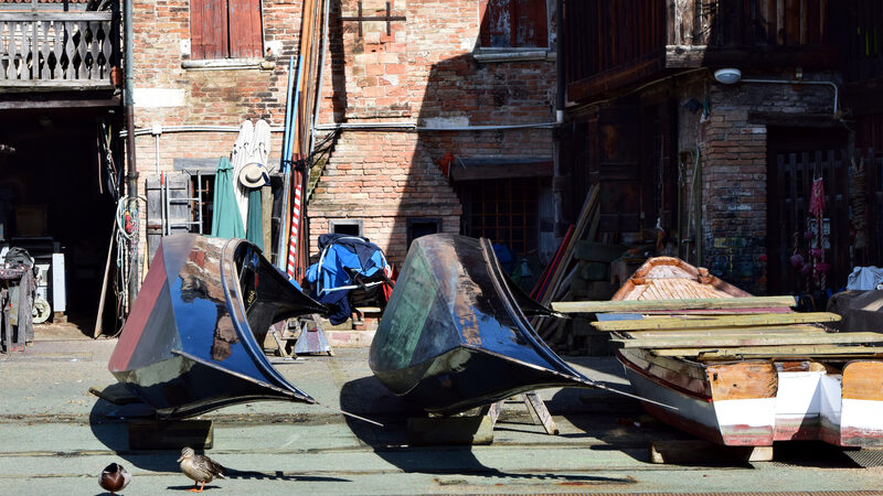 Squero di San Trovaso : Flipped over and likely due for a paint job, these gondolas expose their flat-bottomed hulls — an essential feature for navigating Venice’s shallow canals