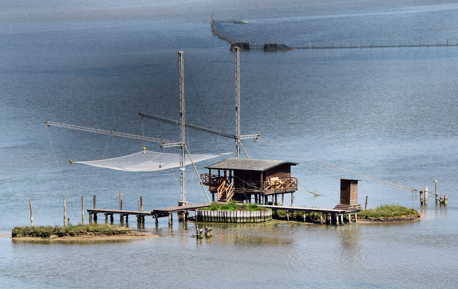 Torcello Belltower : One of the more modern fishing huts that dot the lagoon, typically built on tiny islets scattered throughout the waters