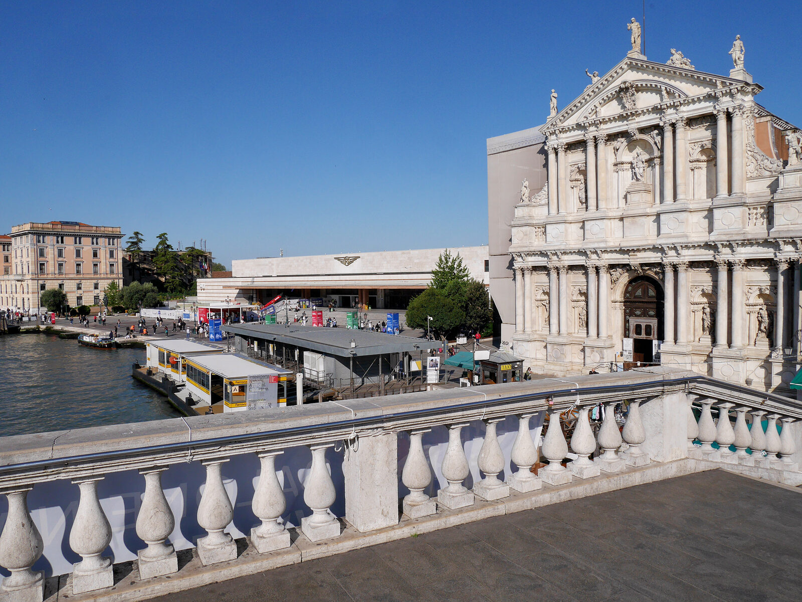 Venice Train Station : The church that was not demolished (Chiesa di Santa Maria di Nazareth) still stands today, its ornate Baroque style contrasting sharply with the modern station beside it
