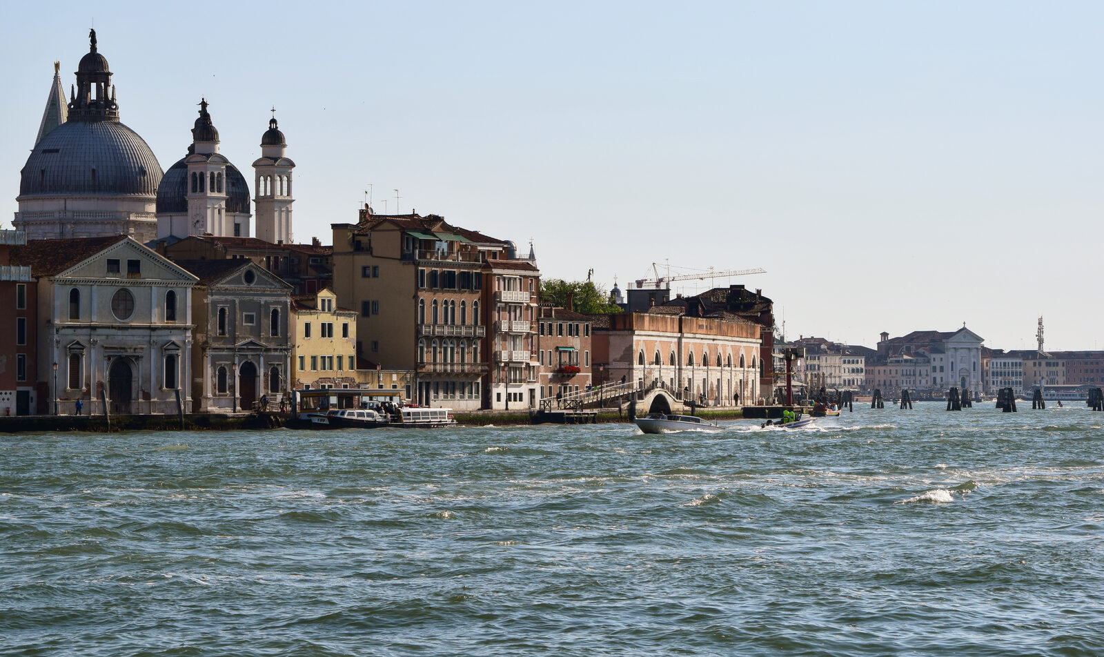 Zattere : From Giudecca, you get a sweeping view of the entire promenade — here, its eastern side — with the iconic bell towers of Santa Maria della Salute on the left and Riva degli Schiavoni stretching off to the right